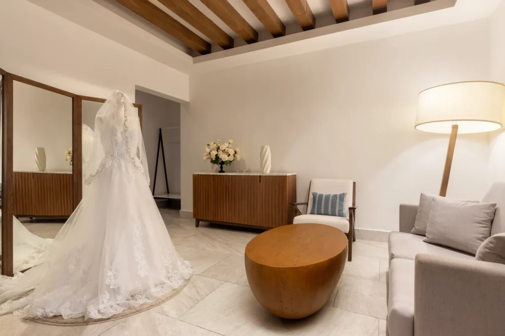 Elegant bridal suite with wedding dress at Dreams Cap Cana Resort & Spa in Punta Cana.