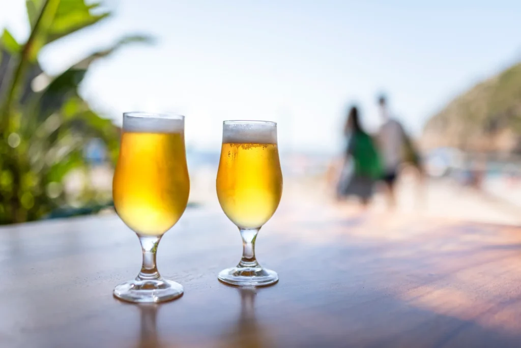 The Coral Keg sports bar at Dreams Cap Cana Resort & Spa featuring a lively pub-style setting, big-screen TVs, and casual dining atmosphere.