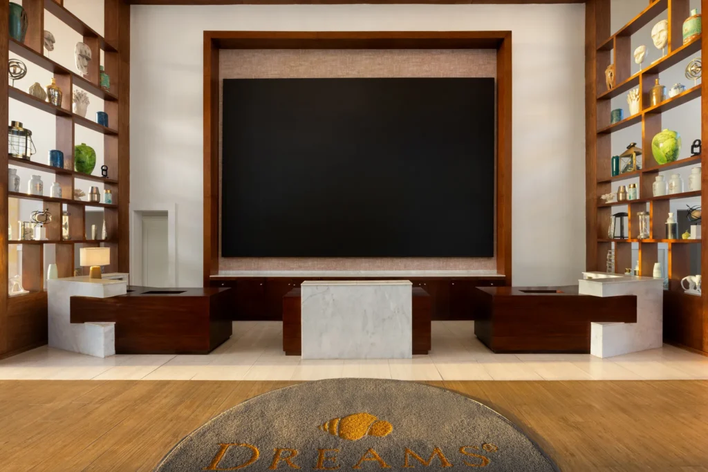 Stylish reception area with seating and décor at Dreams Cap Cana Resort & Spa.