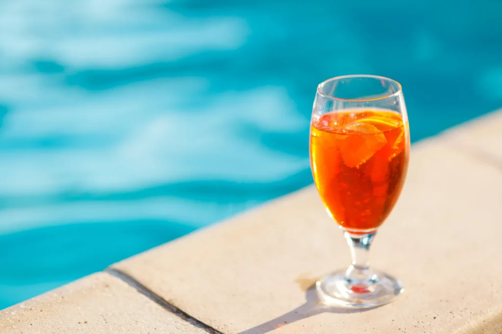 Sugar Reef beach bar at Dreams Cap Cana Resort & Spa featuring a laid-back oceanfront setting, tropical drinks, and palm-lined Caribbean views.
