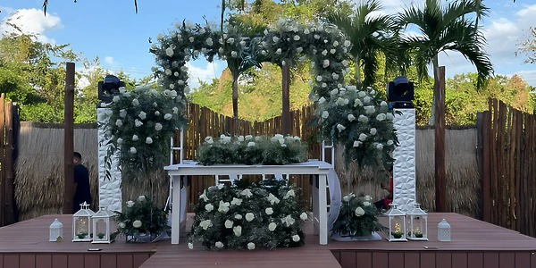 Garden reception setup with floral décor at Dreams Cozumel Cape