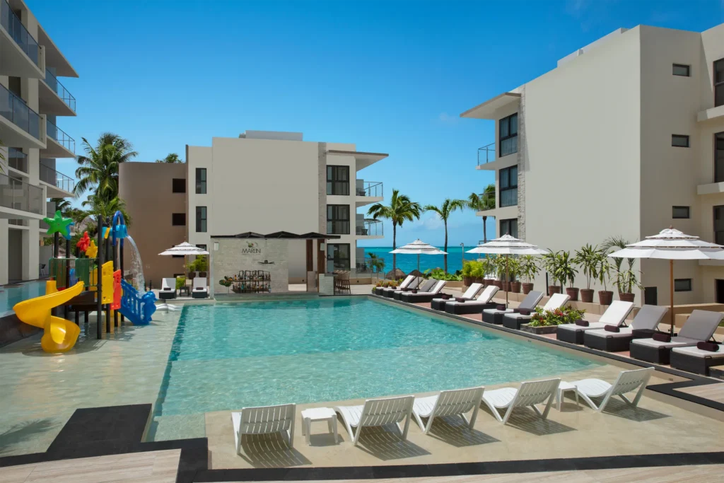 Main swimming pool with kids splash area at Dreams Cozumel Cape Resort & Spa.