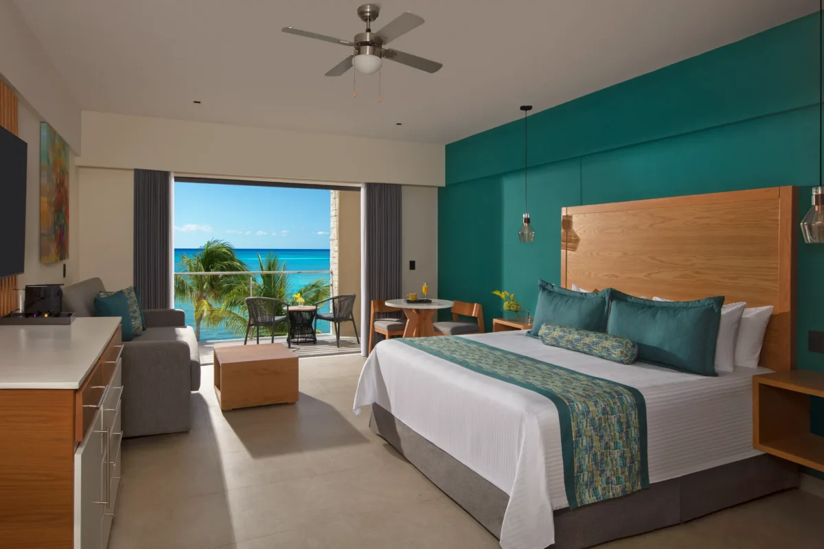 Preferred Club Junior Suite Ocean Front with king bed and direct ocean views at Dreams Cozumel Cape Resort & Spa.