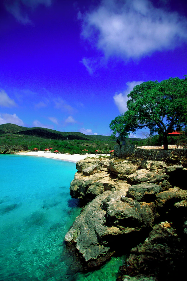 Grote Knip Beach near Dreams Curaçao Resort, Spa & Casino with turquoise waters and scenic cliffside views