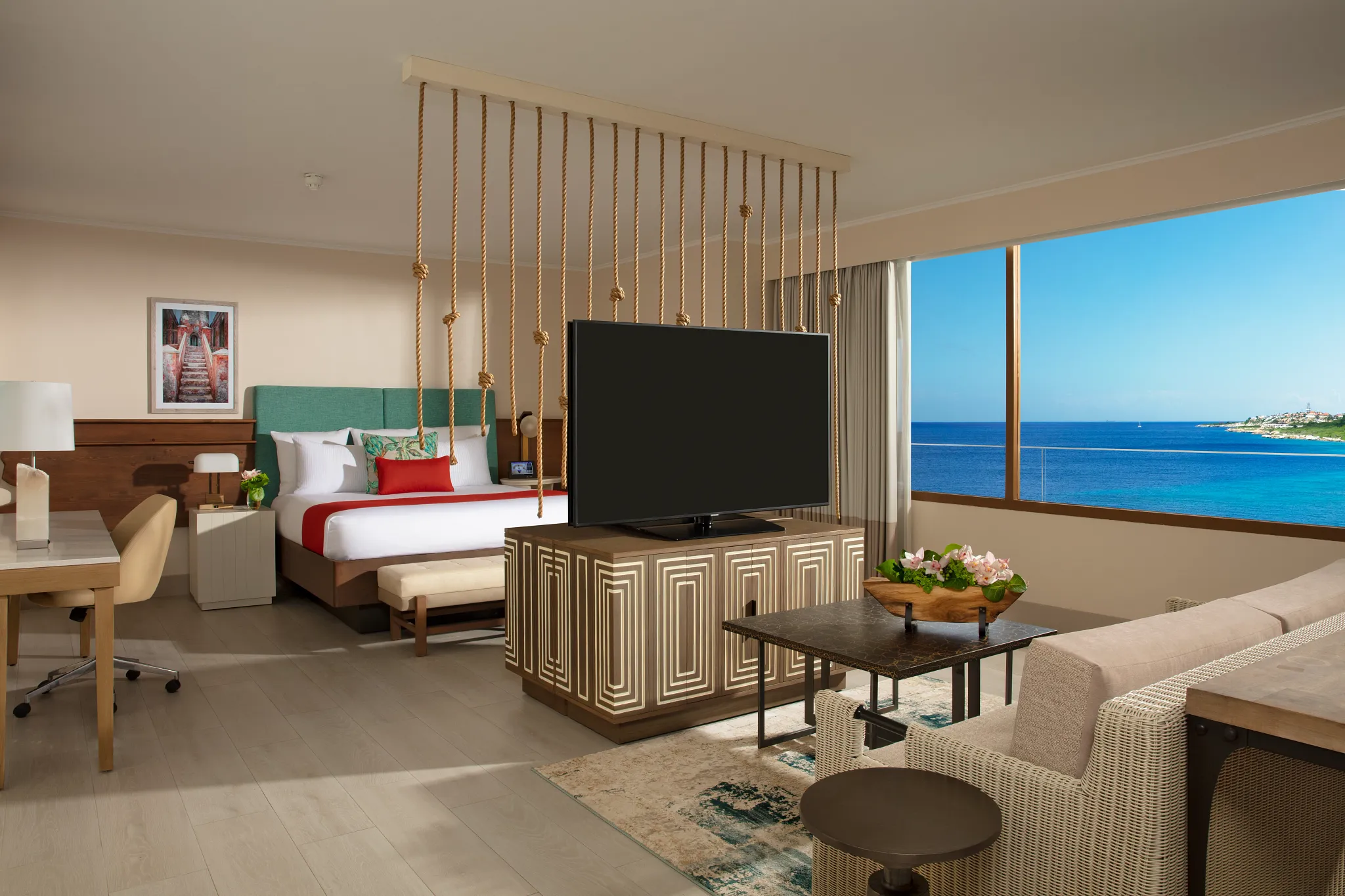 Preferred Club Presidential Suite at Dreams Curaçao featuring spacious luxury bedroom with king bed, elegant furnishings, premium amenities, and stunning ocean views
