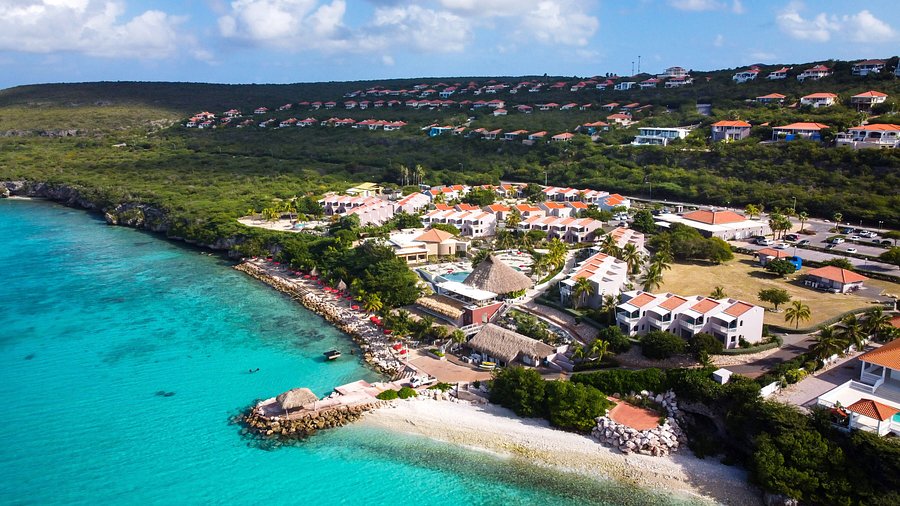 Coral Estate Luxury Resort Curaçao oceanfront villas and suites with private pools, cliffside views, and secluded Caribbean setting.