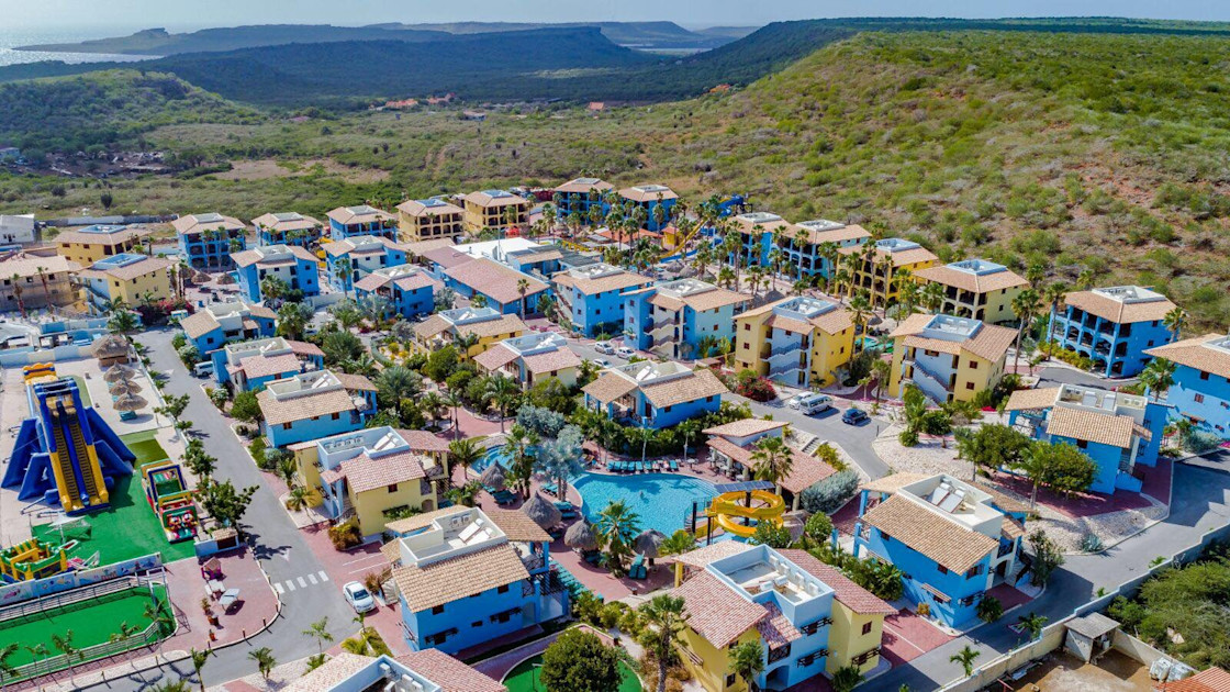 Kunuku Aqua Resort Curaçao family-friendly waterpark resort with pools, slides, and tropical gardens in the Caribbean.