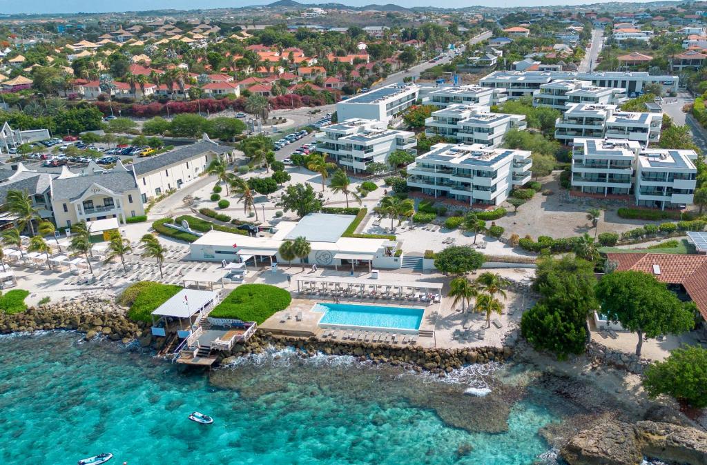Papagayo Beach Hotel Curaçao modern boutique beachfront property with trendy beach club atmosphere and Caribbean Sea views.