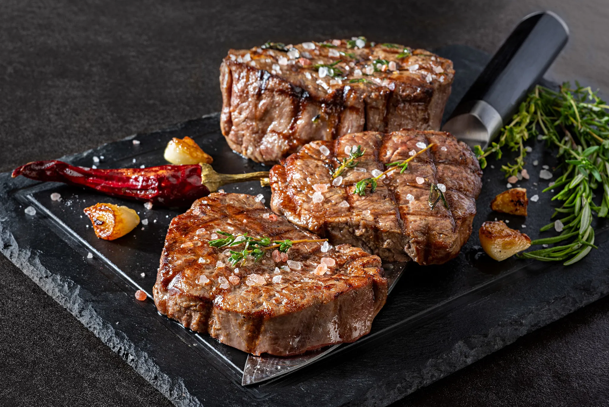 Grilled premium steaks at The Strip Grill steakhouse at Breathless Riviera Cancun Resort & Spa