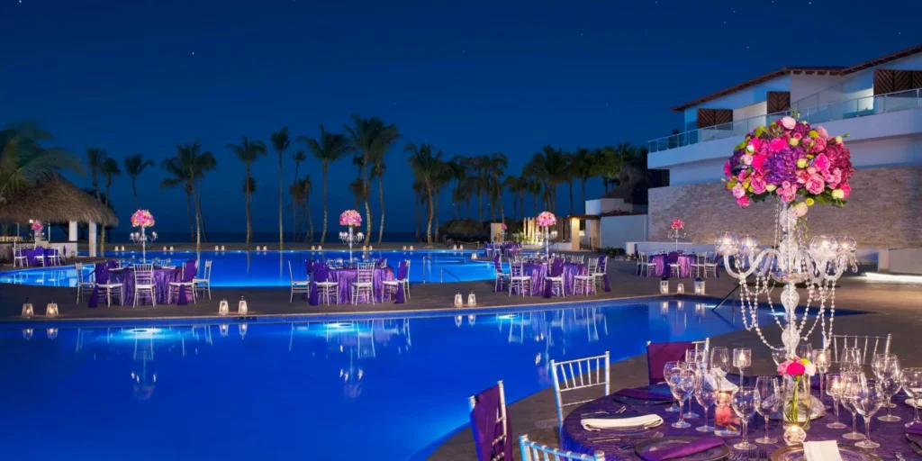 Poolside wedding reception setup at Dreams Dominicus La Romana