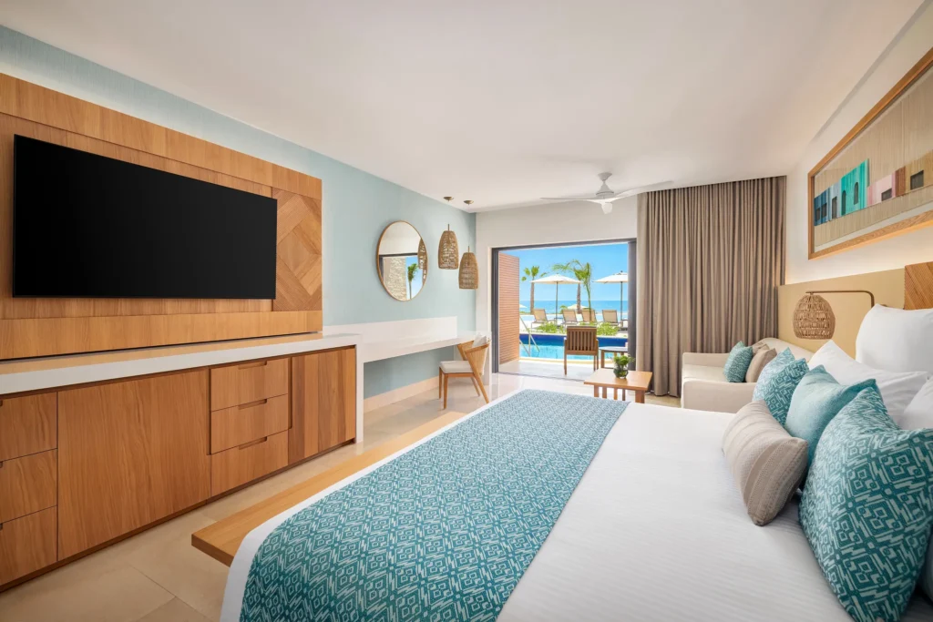 Junior Suite Swim Out with king bed and terrace pool access at Dreams Estrella del Mar Mazatlan Golf & Spa Resort.
