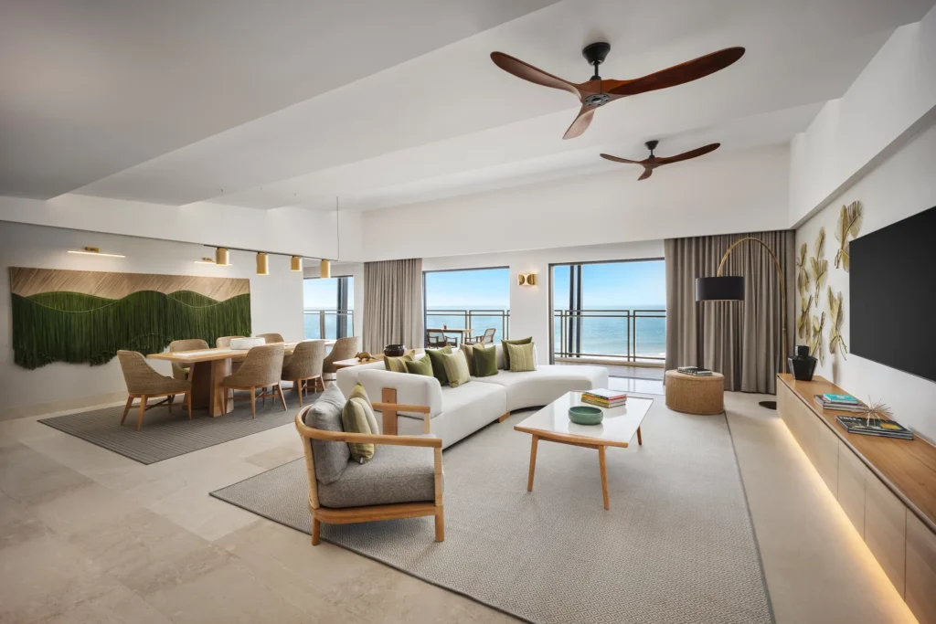 One-Bedroom Presidential Suite Ocean Front living and dining area with ocean views at Dreams Estrella del Mar Mazatlan.