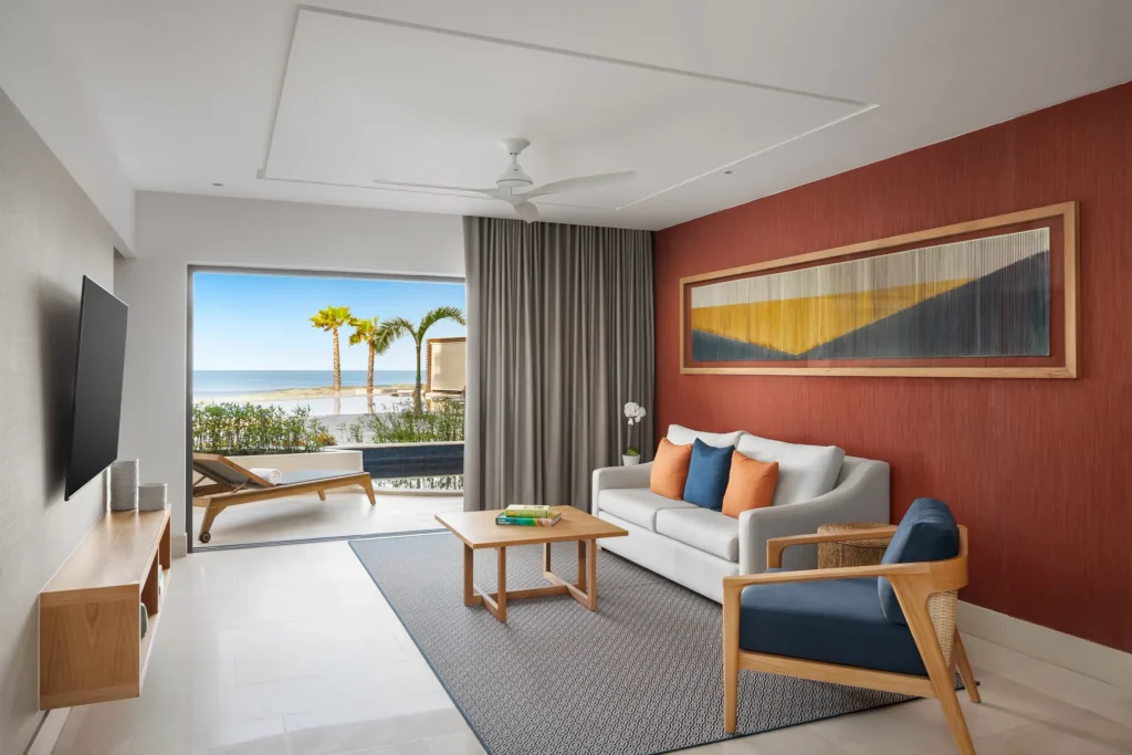 Preferred Club Premium Master Suite Swim Out living room with terrace access at Dreams Estrella del Mar Mazatlan.