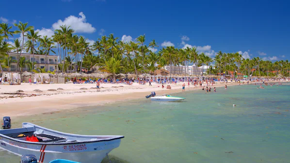 Cabeza de Toro Beach near Dreams Flora Resort & Spa with white sand, turquoise waters, and palm-lined shoreline