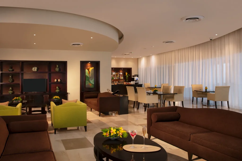 Preferred Club lounge seating area at Dreams Jade Resort & Spa.