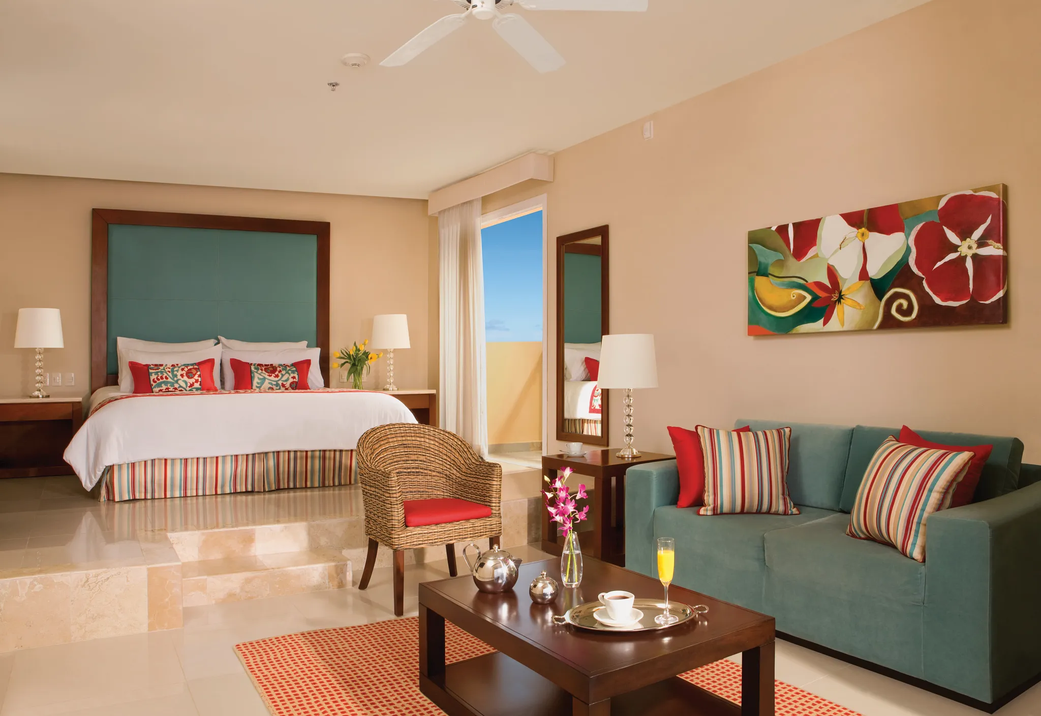 Junior Suite Tropical View king bed with private balcony at Dreams Jade Resort & Spa.