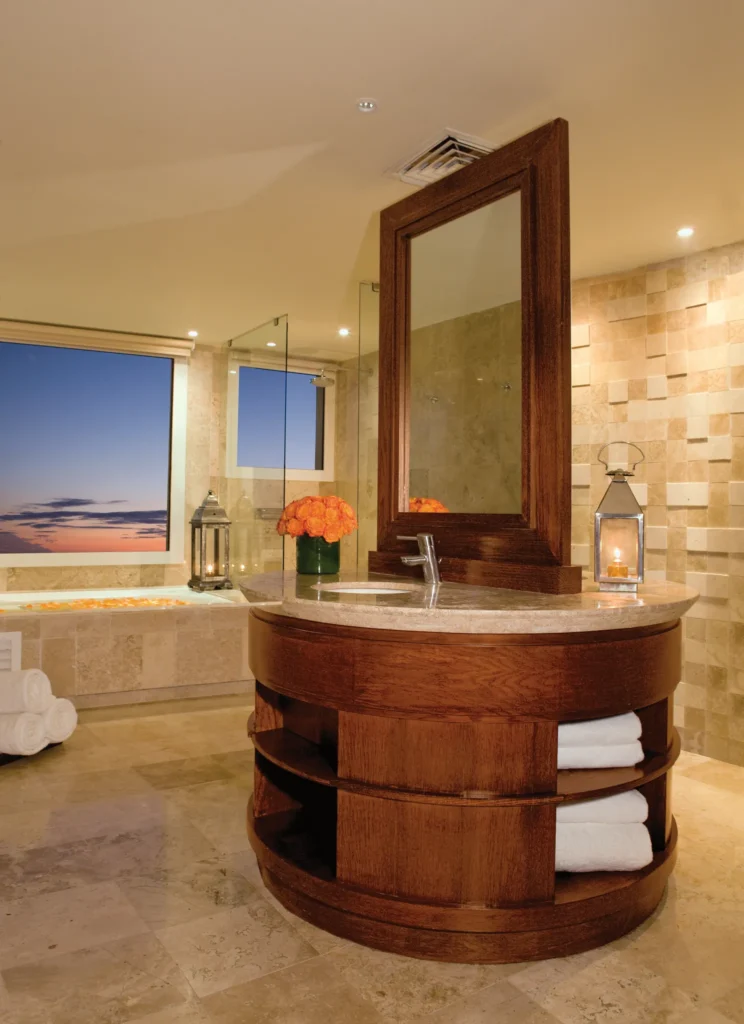 Preferred Club Governor Suite bathroom with hot tub, rain shower, and bidet at Dreams Jade Resort & Spa.