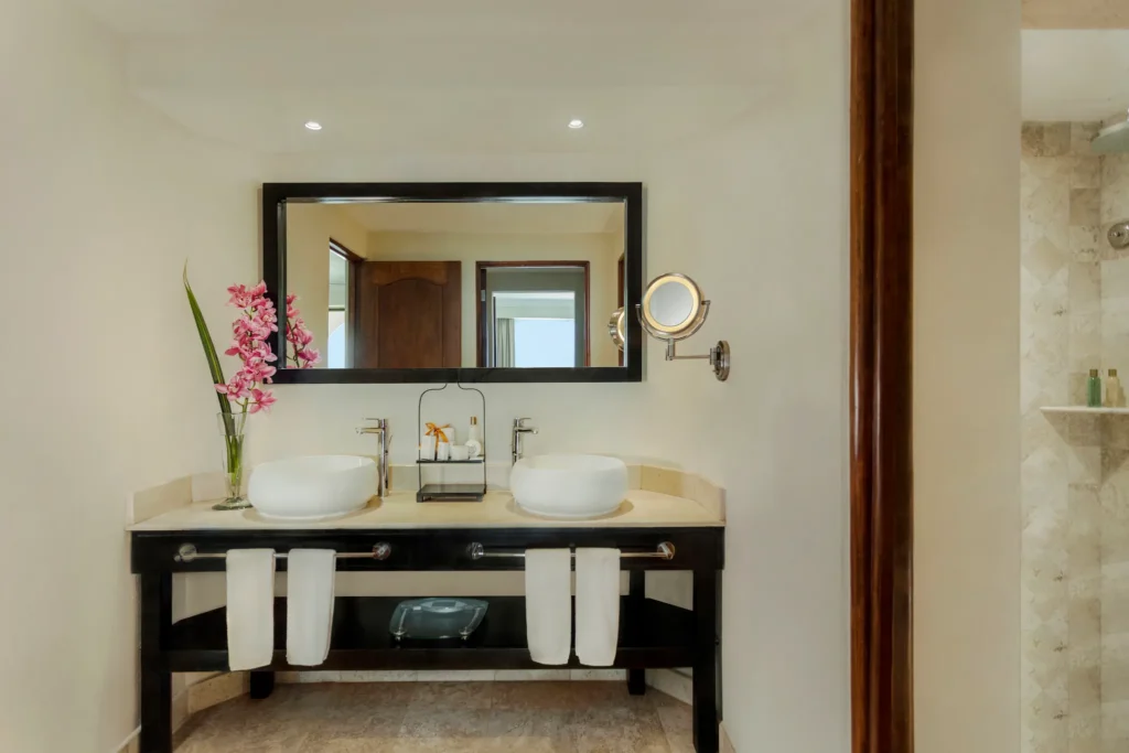 Preferred Club One Bedroom Suite Ocean View bathroom vanity with dual vessel sinks at Dreams Los Cabos Suites Golf Resort & Spa.