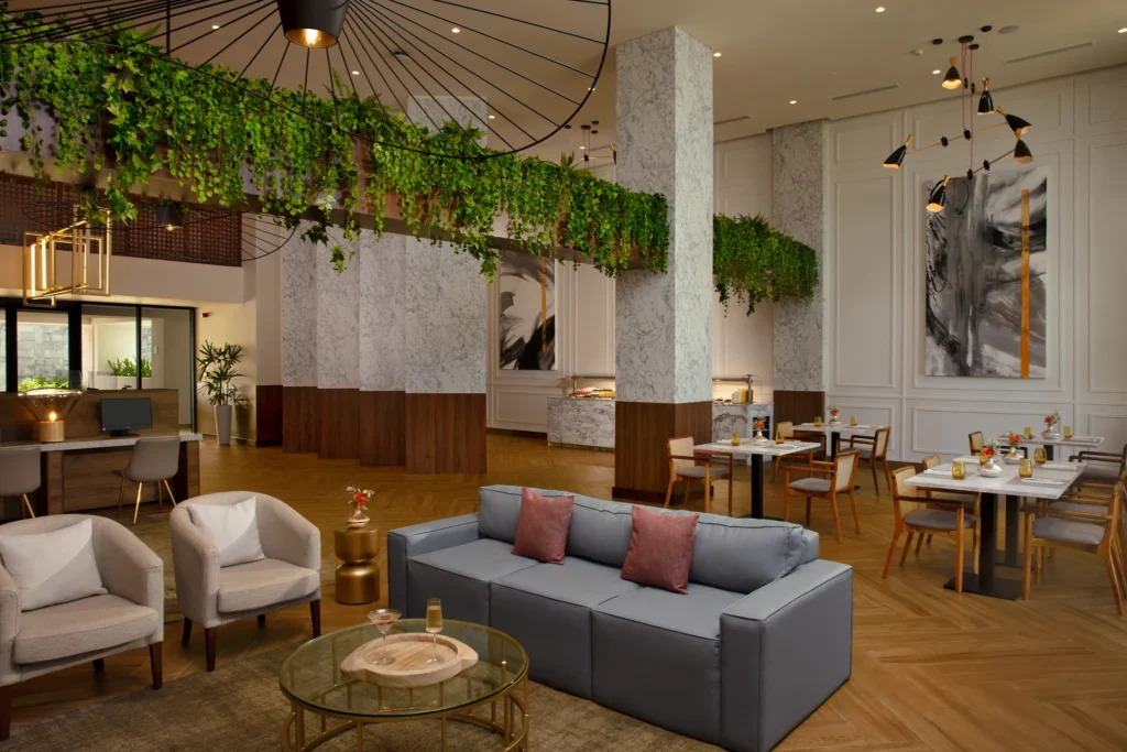Preferred Club Bar at Dreams Macao Beach Punta Cana featuring upscale lounge seating, premium cocktails, and exclusive resort ambiance.
