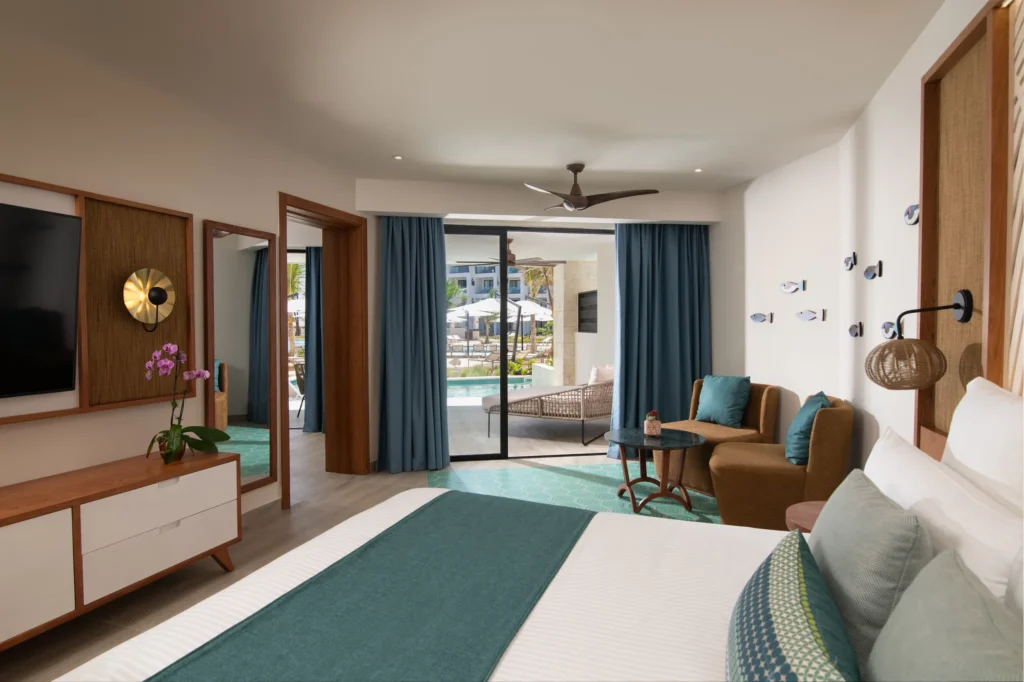 Preferred Club Master Suite Swim Out bedroom with furnished terrace and pool access at Dreams Macao Beach Punta Cana.
