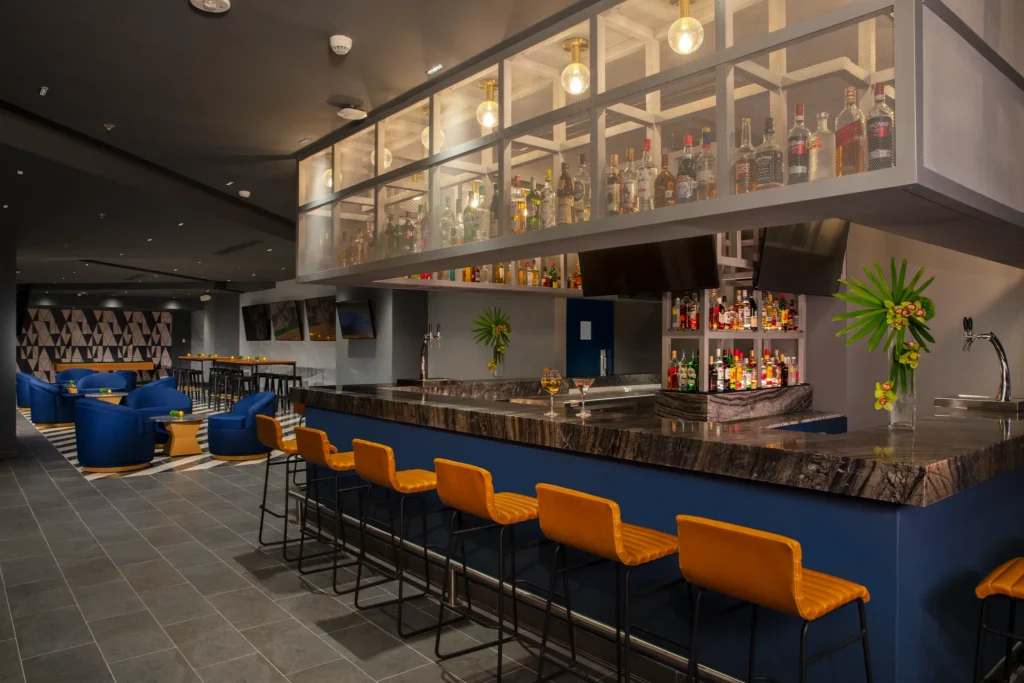 Desires sports and disco bar at Dreams Natura Resort & Spa featuring lively nightlife, dance floor, and casual lounge atmosphere.