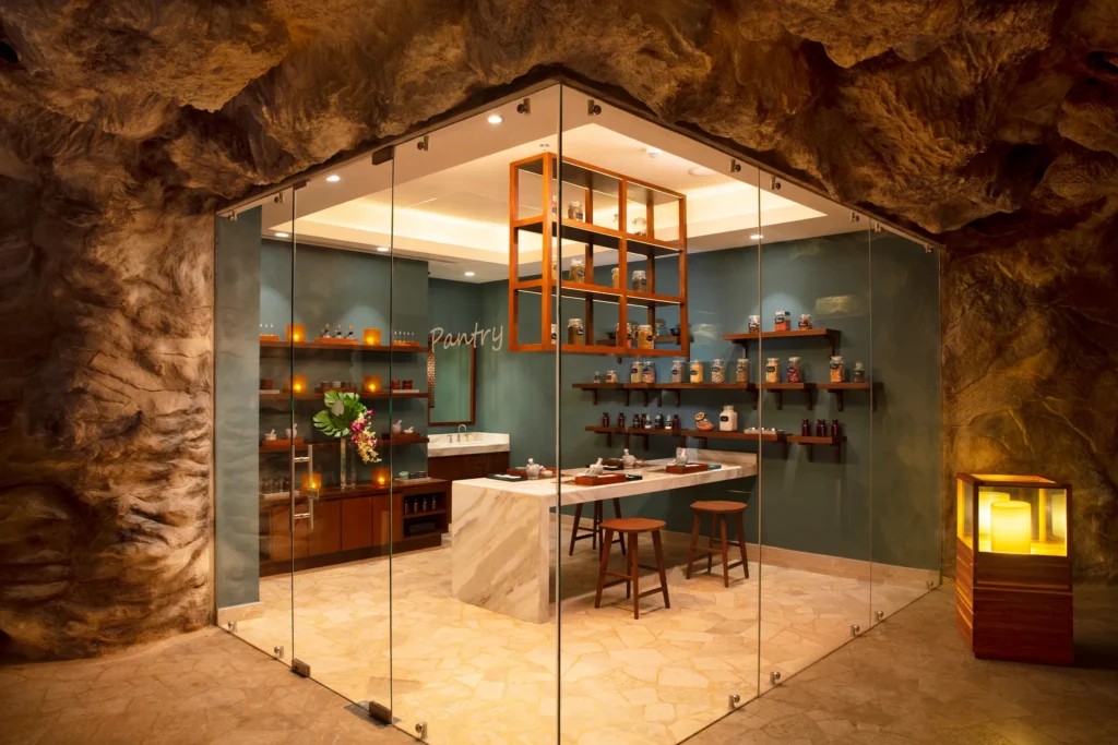 Spa pantry with natural ingredients and treatment stations inside a cave-style setting at Dreams Natura Resort & Spa.