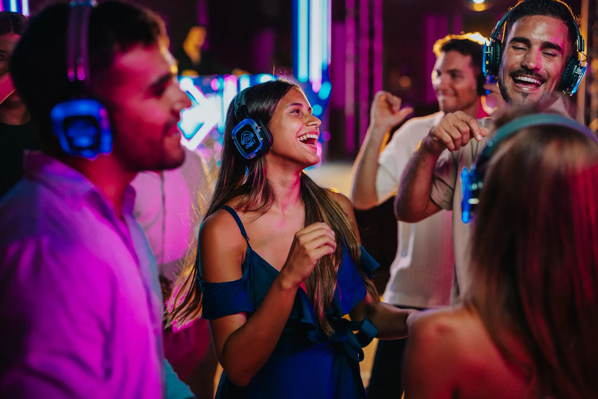 Guests dancing with LED headphones during a silent disco party
