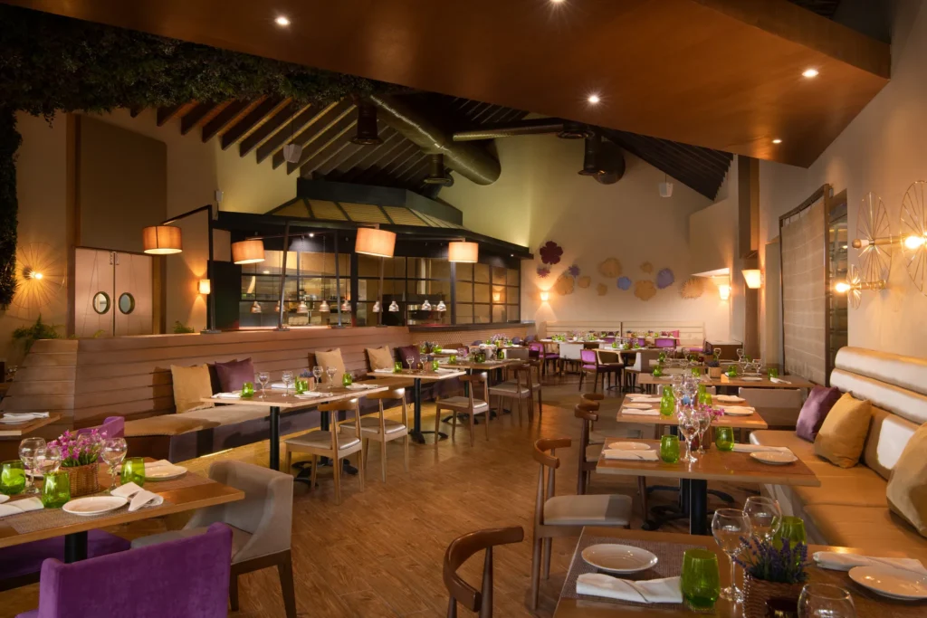 Capers Italian restaurant at Dreams Onyx Resort & Spa featuring elegant dining, classic Italian dishes, and a warm contemporary ambiance.