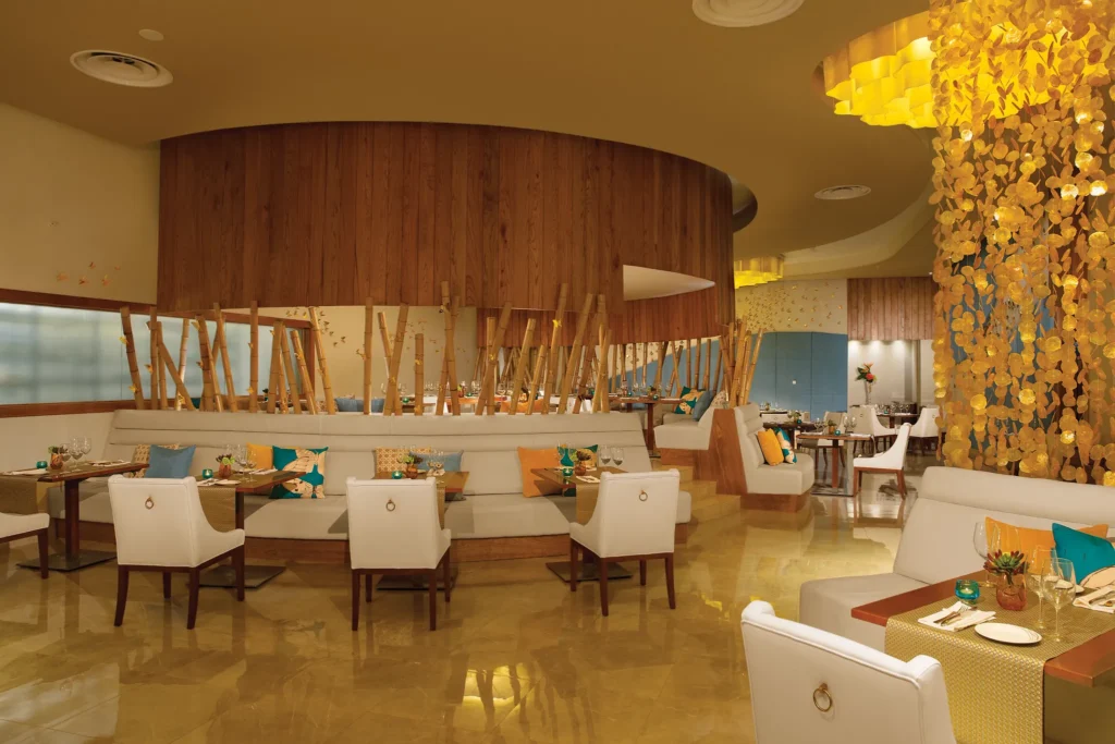 Mercure French restaurant at Dreams Onyx Resort & Spa featuring elegant brasserie-style dining, classic French cuisine, and a refined ambiance.