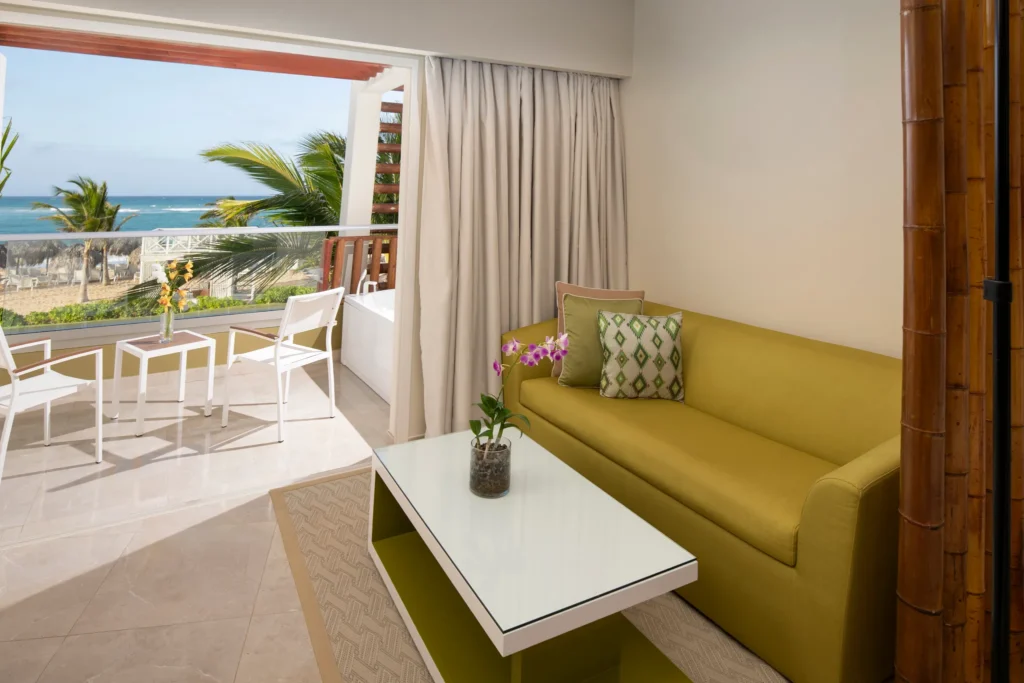 Preferred Club Junior Suite Ocean View terrace with seating and ocean view at Dreams Onyx Resort & Spa.