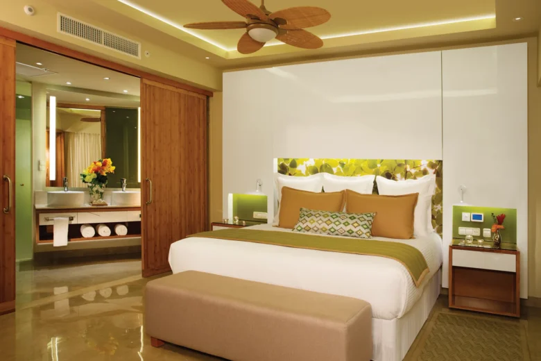 Master bedroom with king bed in Preferred Club Master Suite Ocean Front at Dreams Onyx Resort & Spa.