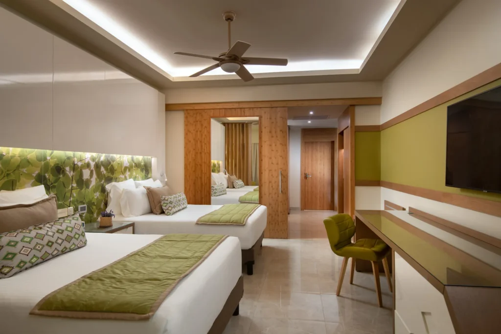 Two Bedroom Family Suite with two double beds and modern design at Dreams Onyx Resort & Spa.