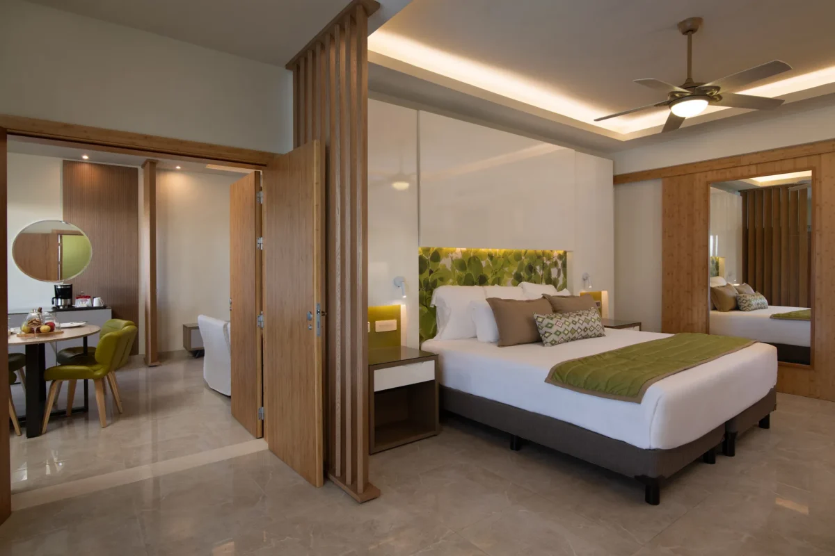 Two Bedroom Family Suite king bedroom with modern décor at Dreams Onyx Resort & Spa.