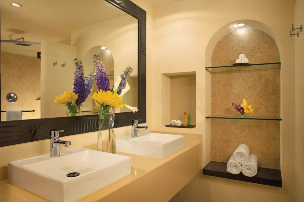 Deluxe Ocean View bathroom with double sinks and modern design at Dreams Playa Bonita Panama.