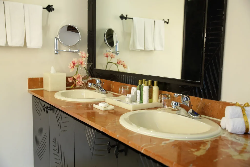Preferred Club Master Suite Ocean View bathroom with double sinks and upscale amenities at Dreams Playa Bonita Panama.
