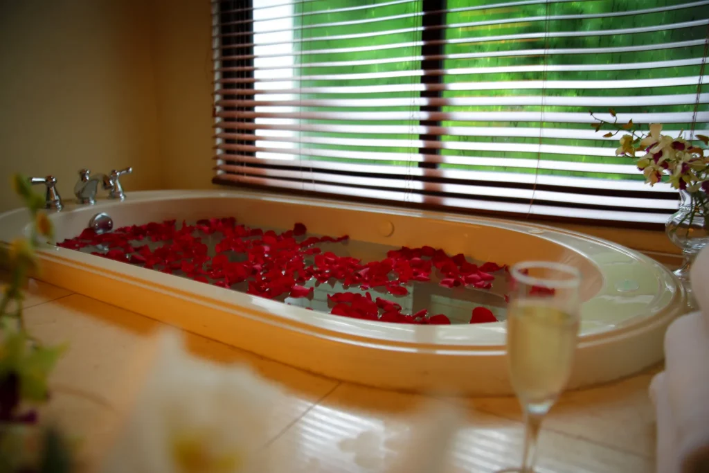 Preferred Club Master Suite Ocean View whirlpool bathtub with rose petals at Dreams Playa Bonita Panama.