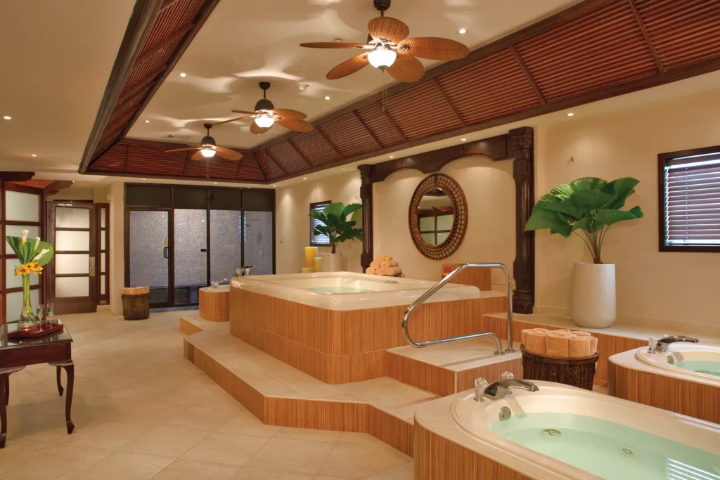 Indoor spa whirlpools with soothing water features at Dreams Playa Bonita Panama, designed for relaxation and wellness.