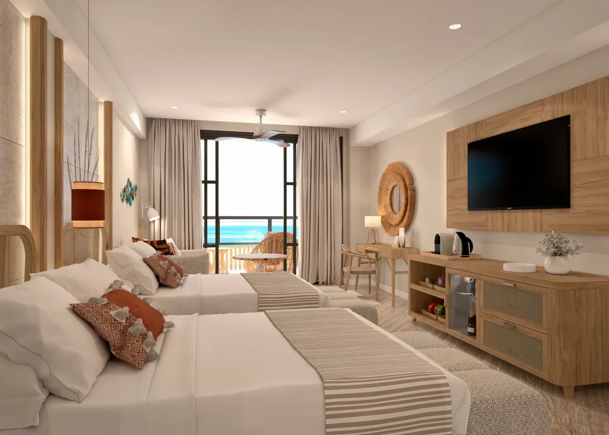 Junior Suite Pool View with two double beds and private terrace at Dreams Playa Esmeralda Resort & Spa.