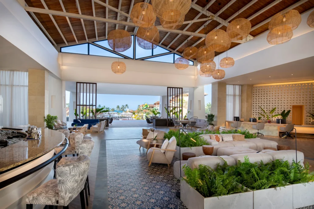 Elegant open-air lobby with tropical décor at Dreams Playa Esmeralda Resort & Spa in the Dominican Republic.