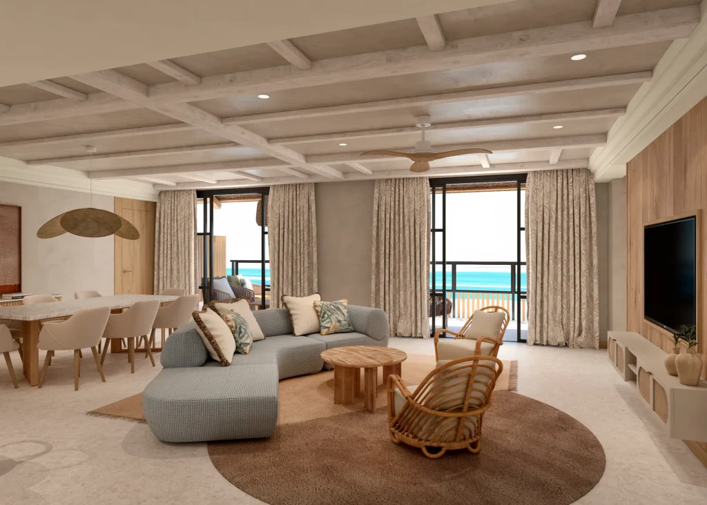 Preferred Club Presidential Ocean Front living room with dining area and ocean views at Dreams Playa Esmeralda Resort & Spa.