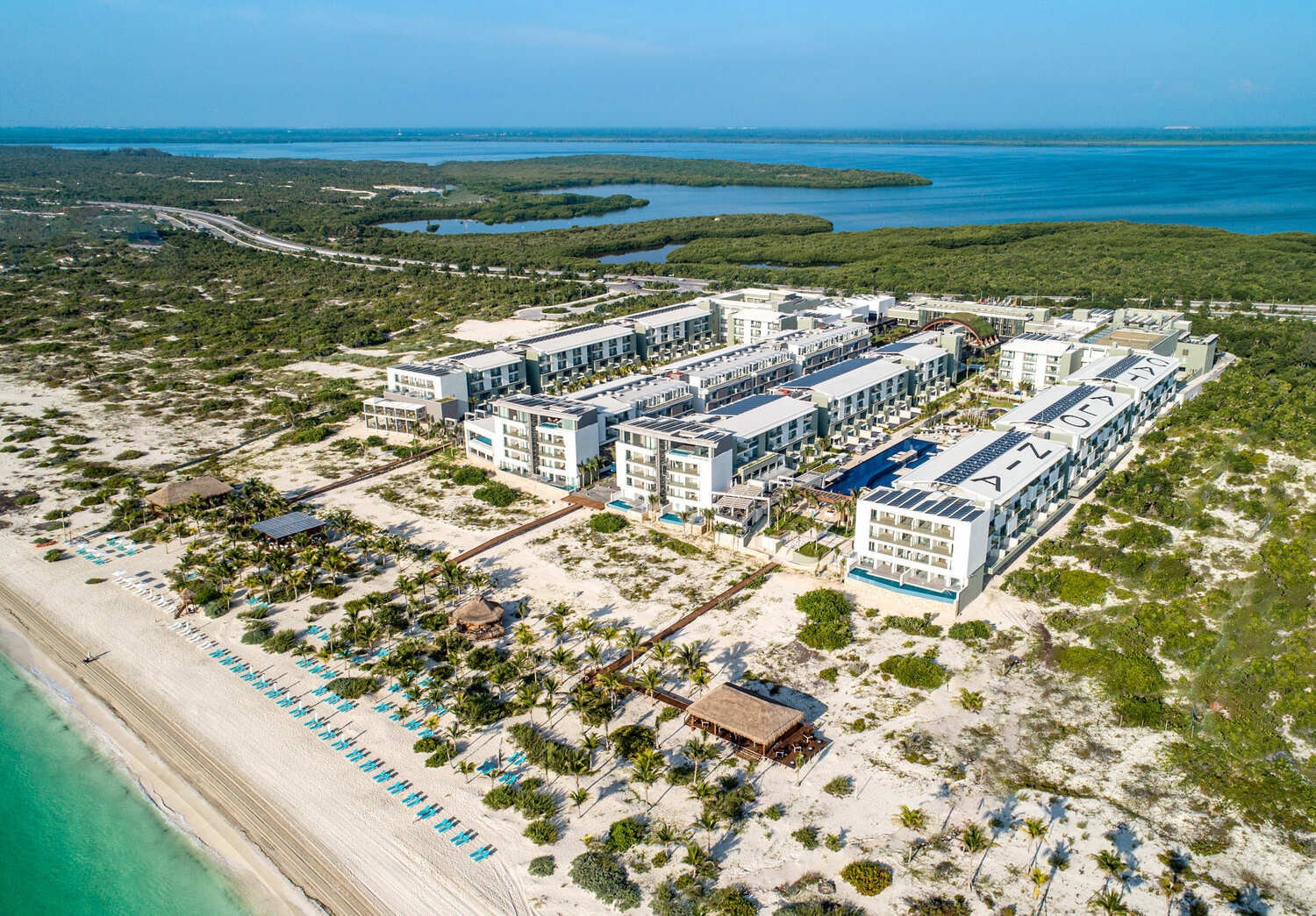 Catalonia Grand Costa Mujeres all-inclusive resort with beachfront pools and modern architecture in Costa Mujeres Mexico.