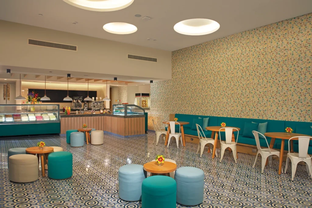 Dolce dessert and coffee shop at Dreams Playa Mujeres Golf & Spa Resort featuring gourmet pastries, gelato, and a modern café-style setting.