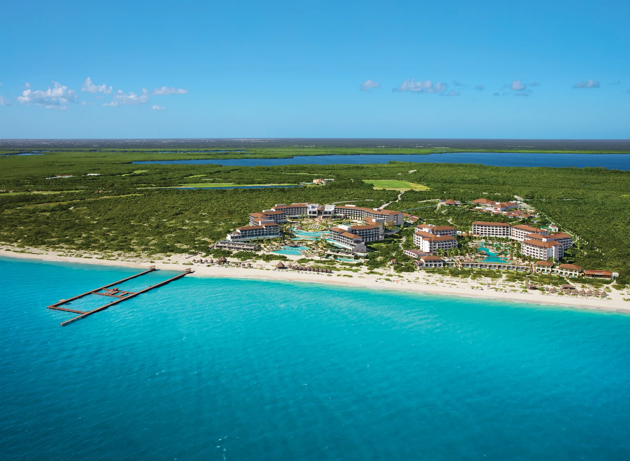 Dreams Playa Mujeres Golf & Spa Resort family-friendly all-inclusive in Playa Mujeres with dolphinarium, golf course, and beachfront pools.