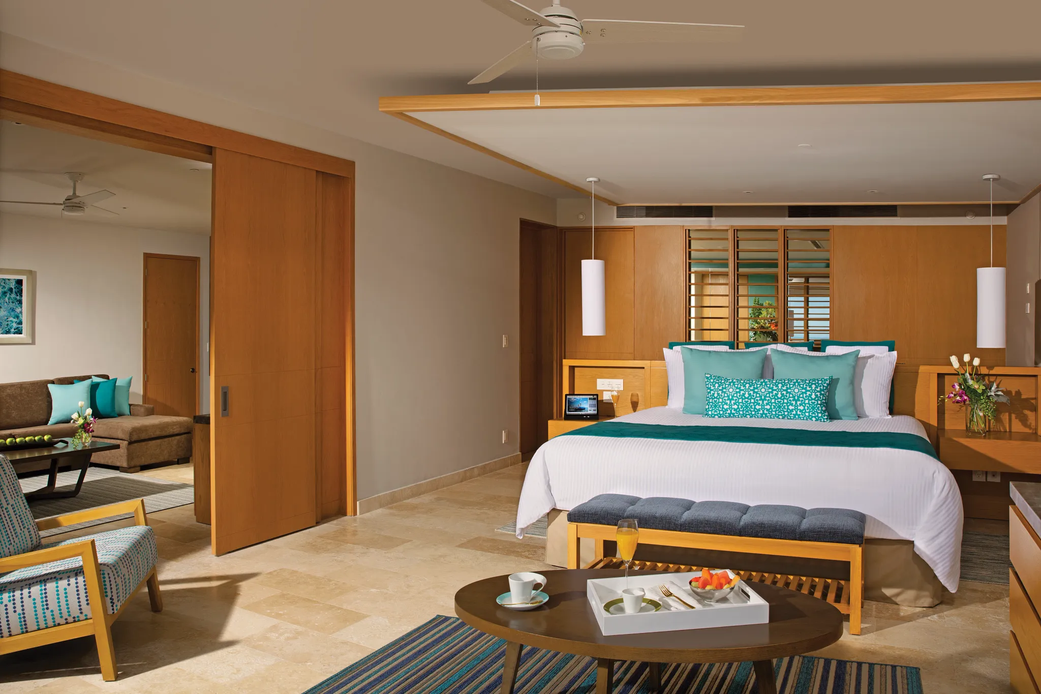 Preferred Club Master Suite Swim Out Ocean View bedroom at Dreams Playa Mujeres with elegant décor and direct swim-out pool access.