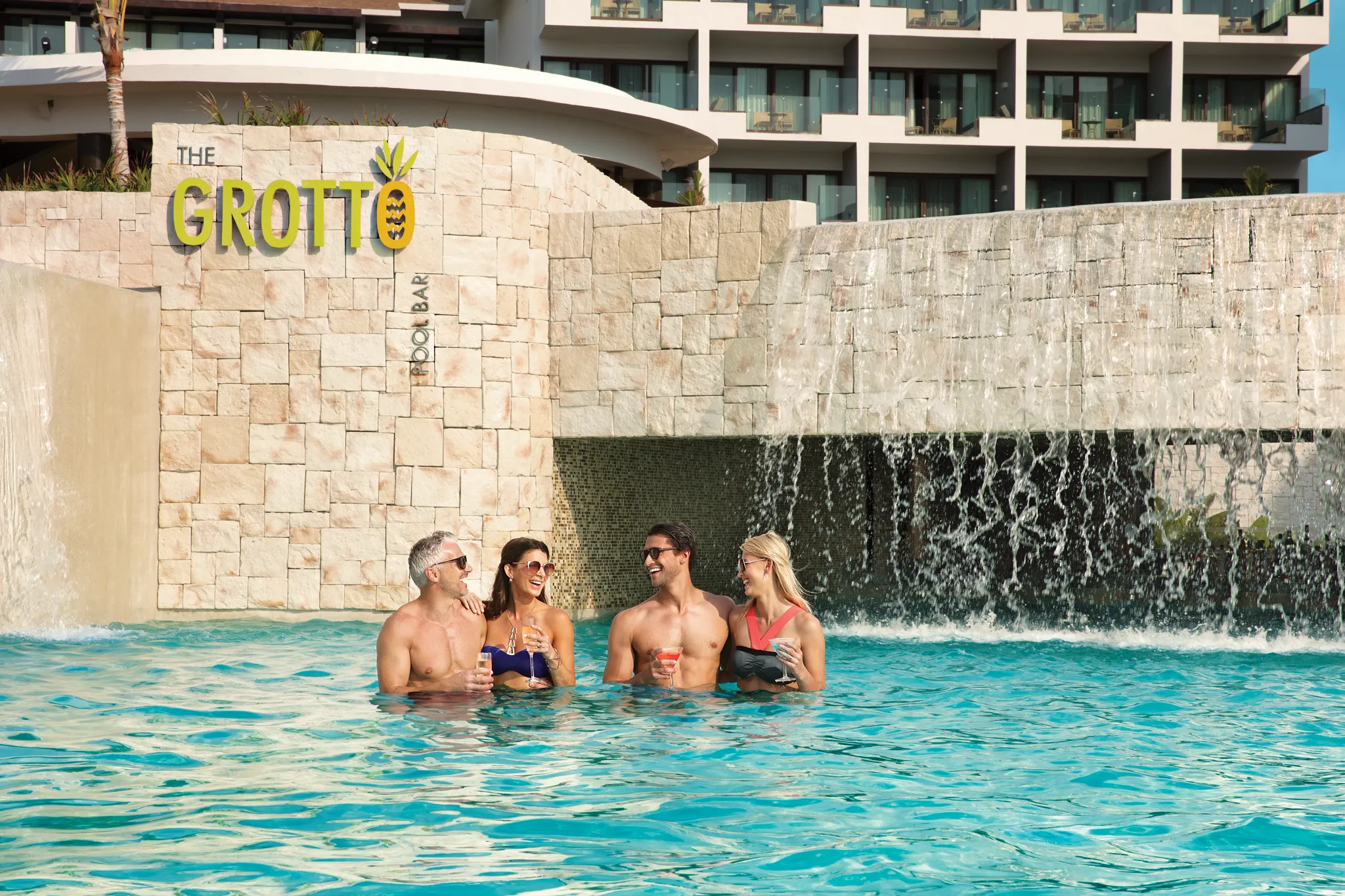 The Grotto swim-up bar at Dreams Playa Mujeres with a cave-like atmosphere in Playa Mujeres