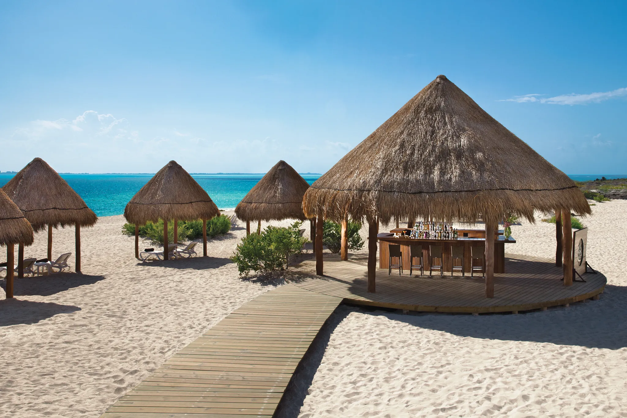 The Sand Bar beach bar at Dreams Playa Mujeres for casual beachside drinks in Playa Mujeres