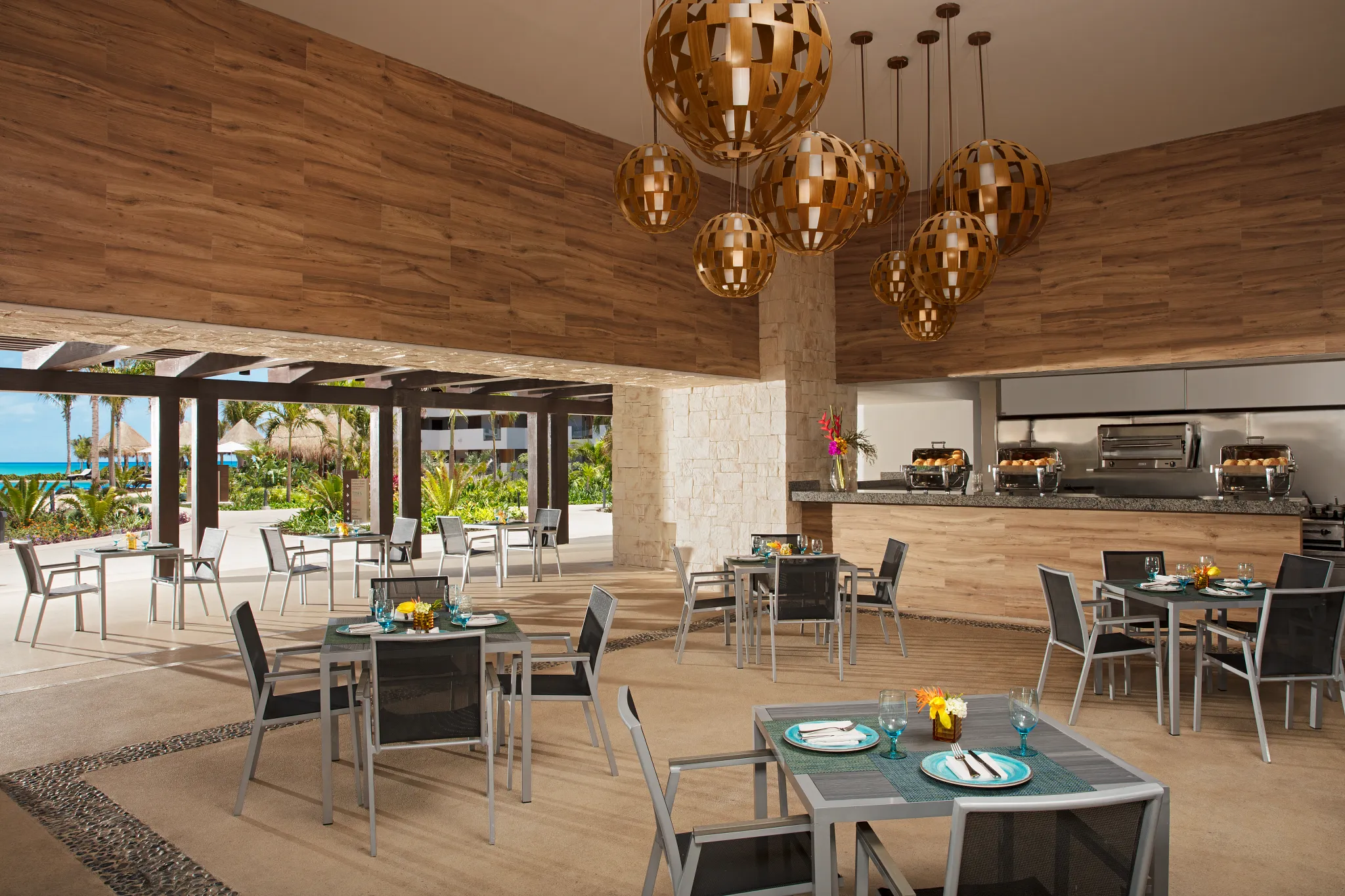 Tides poolside restaurant at Dreams Playa Mujeres serving casual lunch and snacks near the main pool in Playa Mujeres