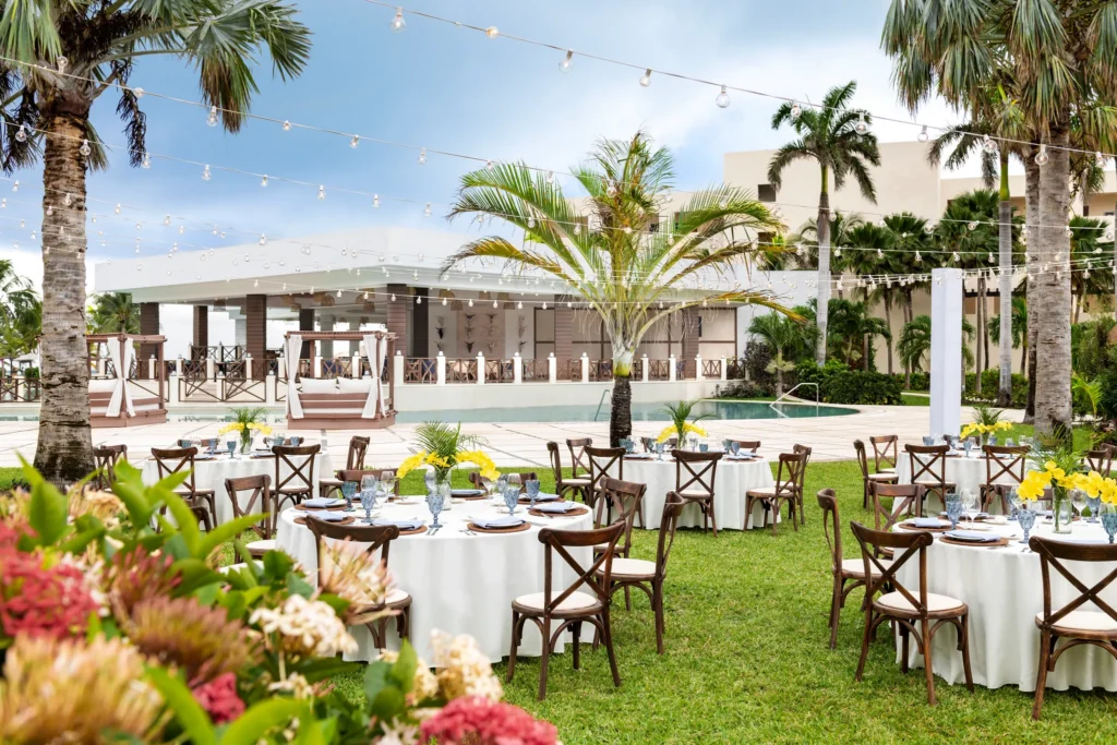 Guava Garden outdoor wedding ceremony setup with tropical greenery at Dreams Puerto Morelos Resort & Spa
