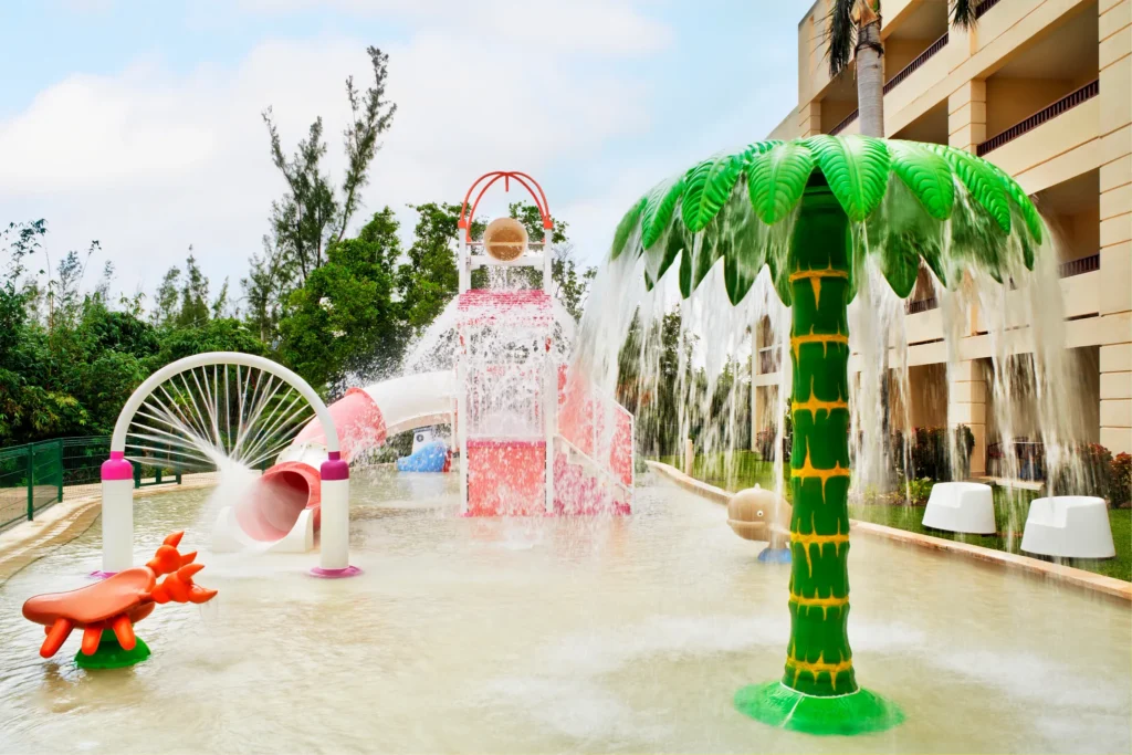 Kids water park with slides and splash features at Dreams Puerto Morelos Resort & Spa.