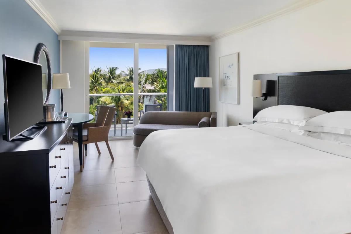Mountain View king room with private balcony at Dreams Rose Hall Resort & Spa in Jamaica.